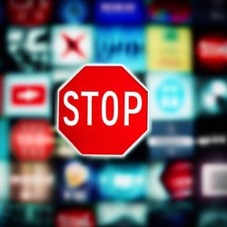 Stop sign with social media in the background.